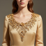 Elegant gold dress jewellery with leaf and flower motifs.